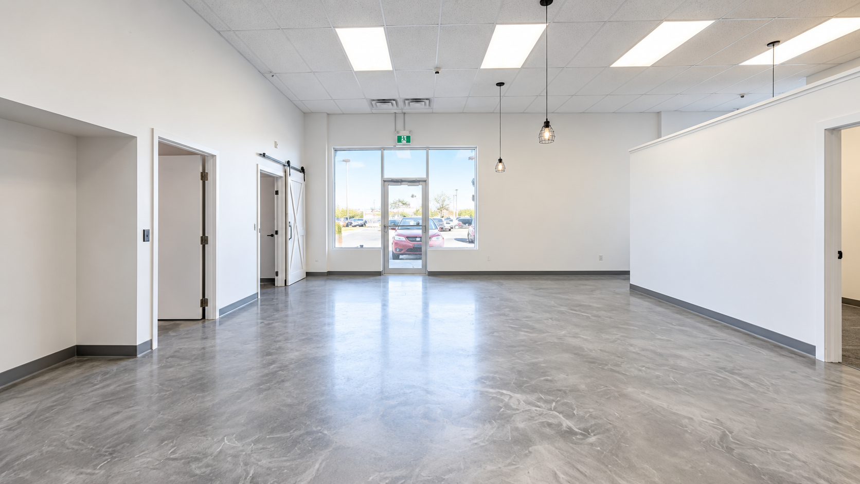 Clean vacant reverse view toward the storefront
